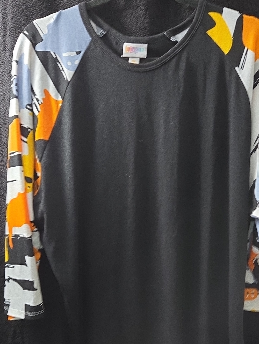 LuLaRoe Randy Black Raglan Long Sleeve with Ghost Print Sleeves